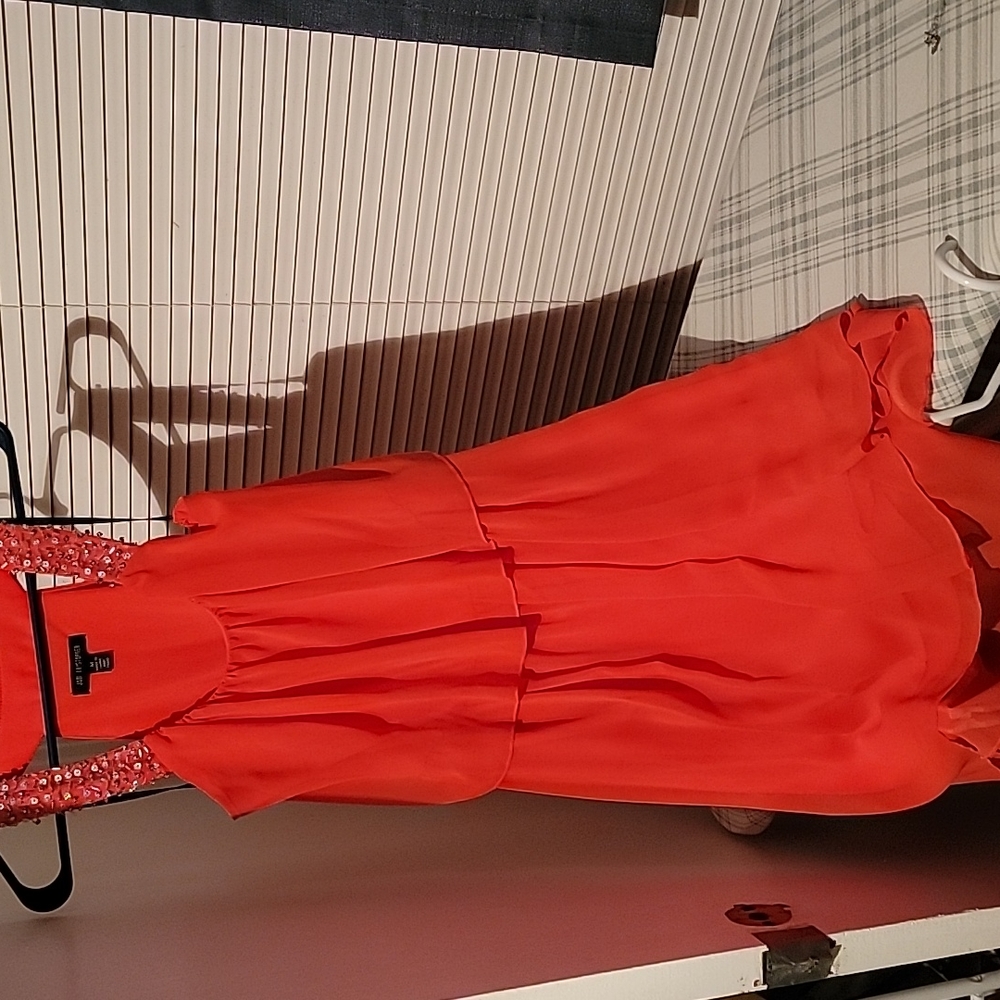 Dress casual . Shrimp color size medium.  Worn once